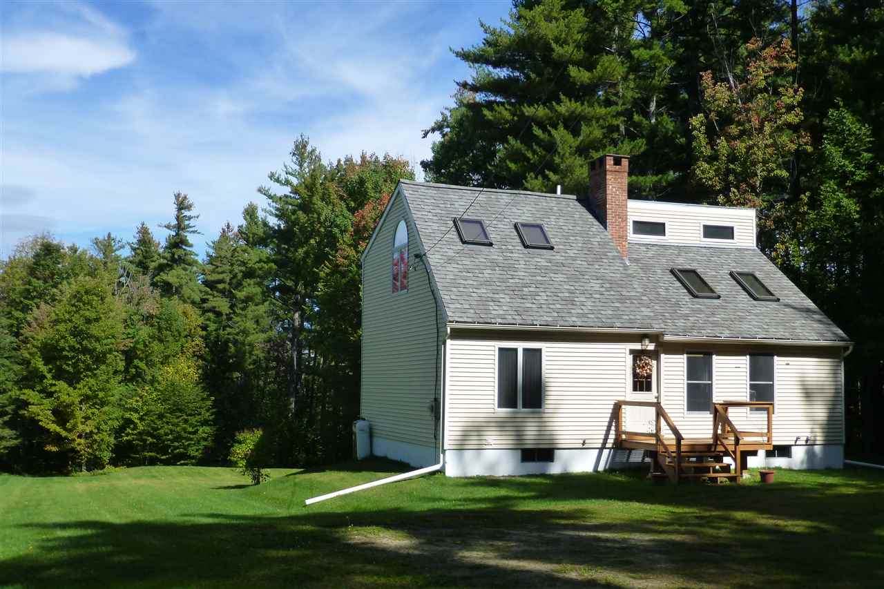 Peaceful private setting on 10.6 acres. Skylights...