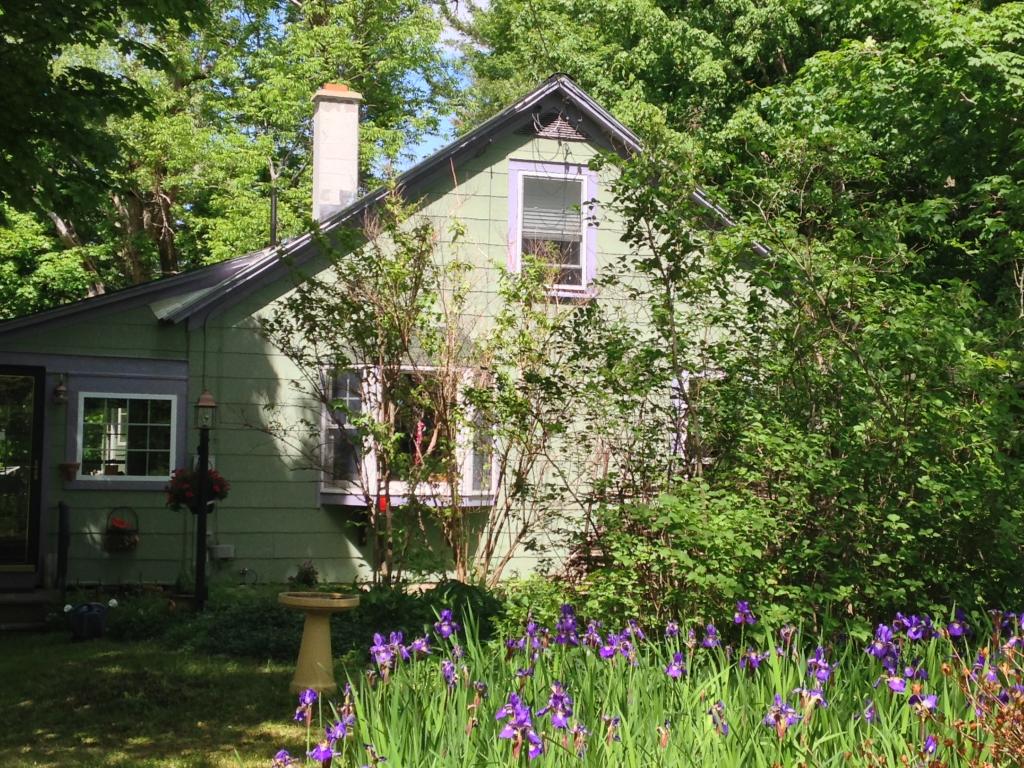 This country cottage-style home is in a lovely...
