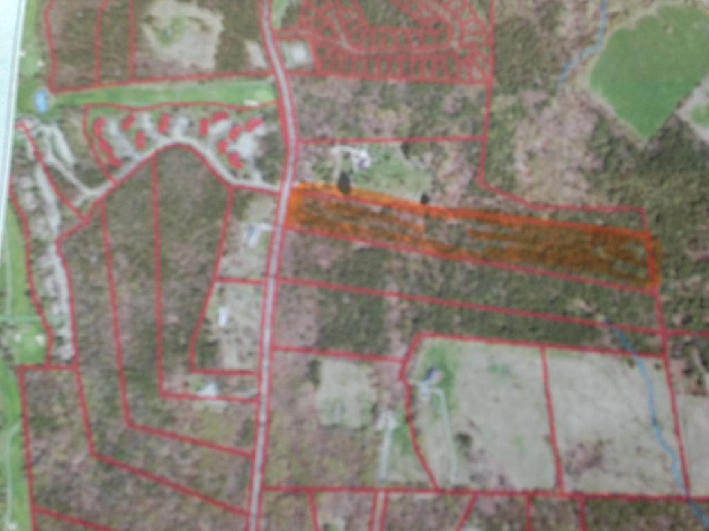 12.46 acres across Mann Road from the entrance to...
