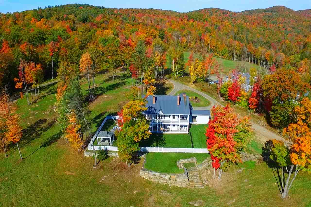 Tucked into the complete privacy of 1,470 acres,...