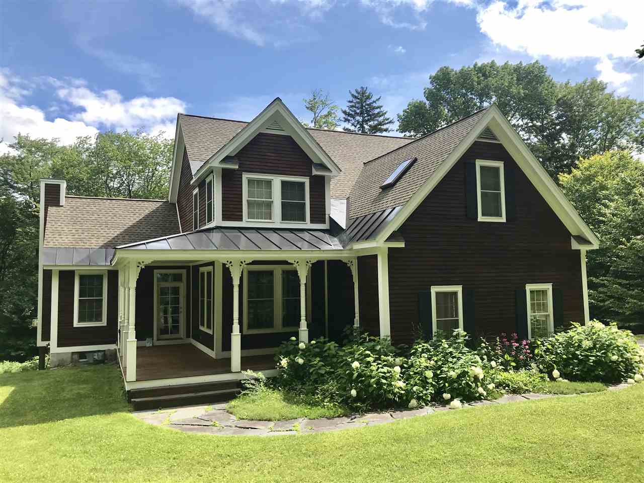 This outstanding custom designed country home on...