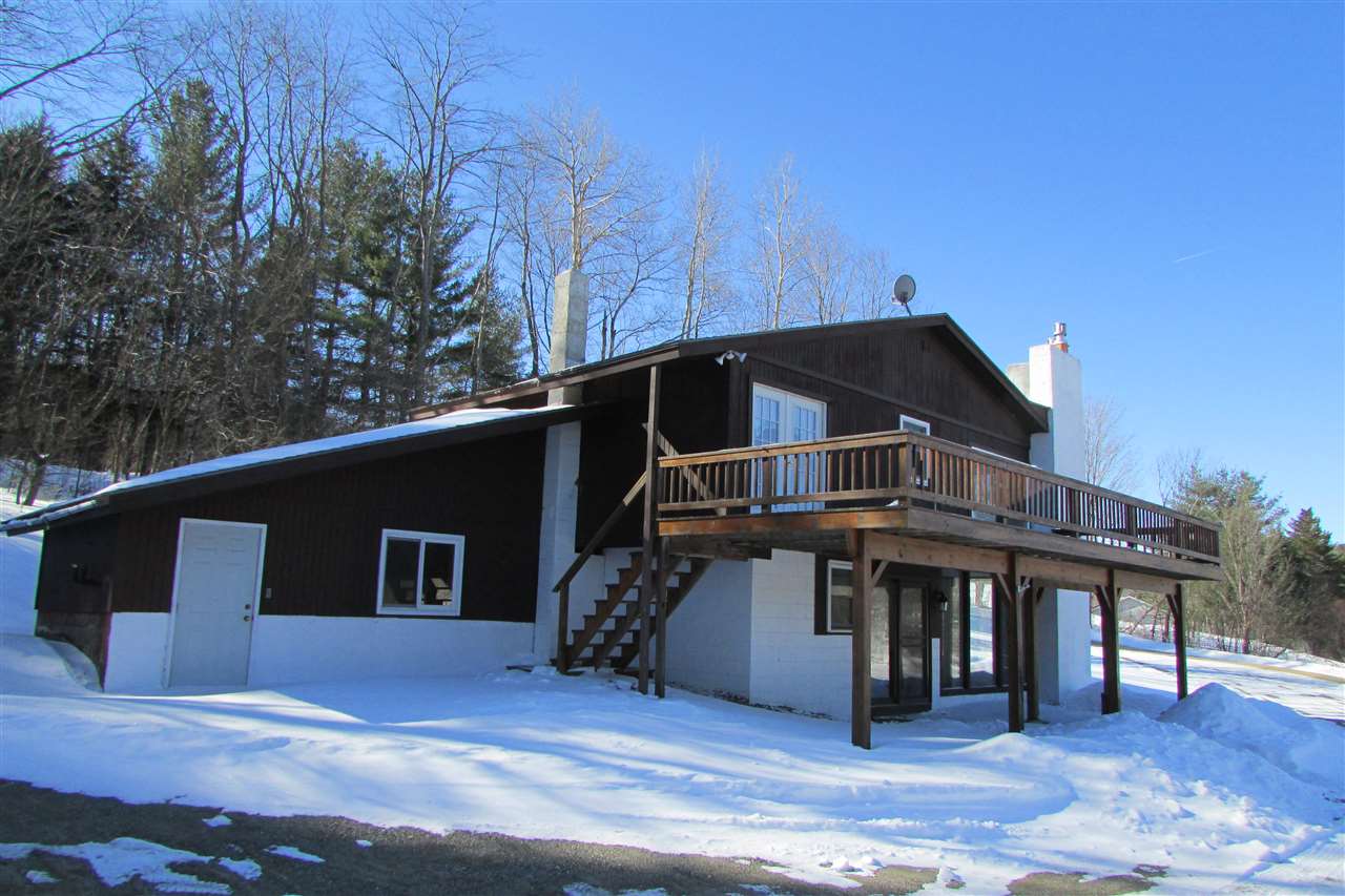 This two family chalet situated on a 1 acre lot...