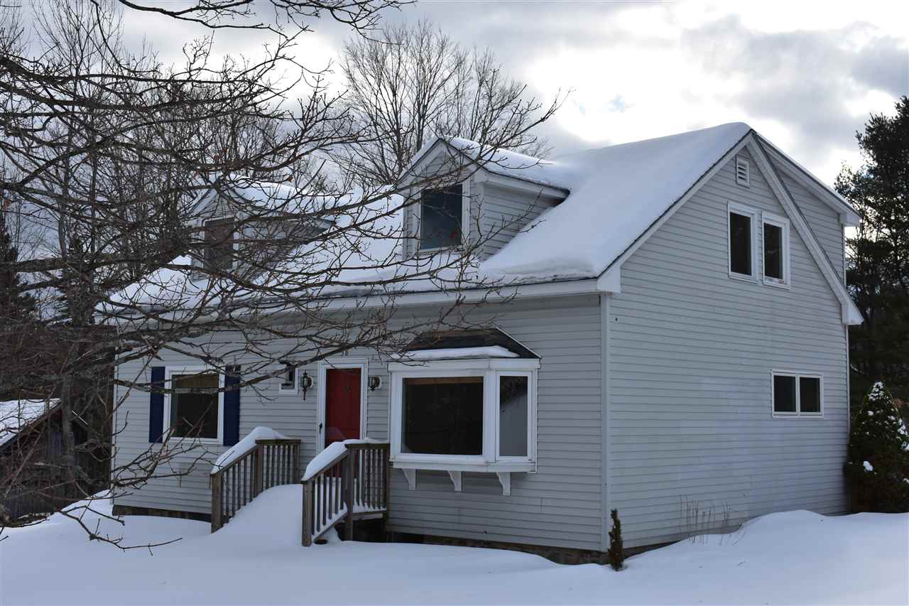 This charming updated Cape style house enjoys a...