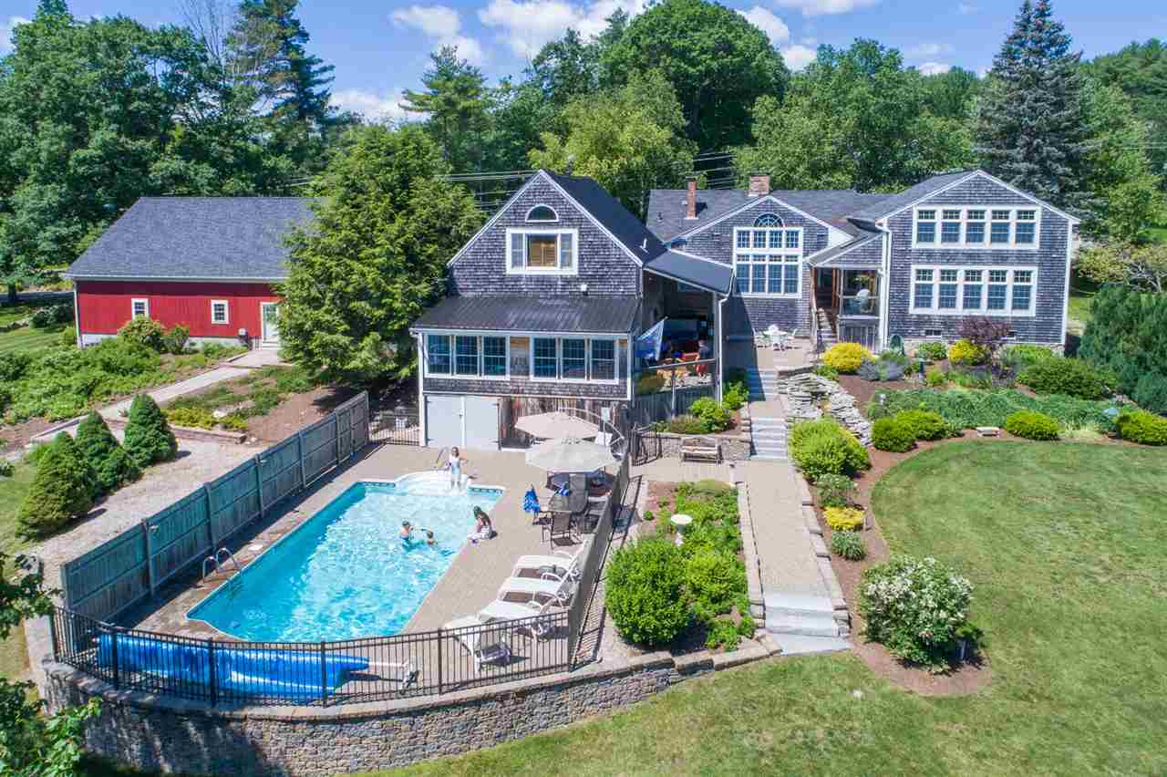 Lake Mirror waterfront home for sale in Tuftonboro