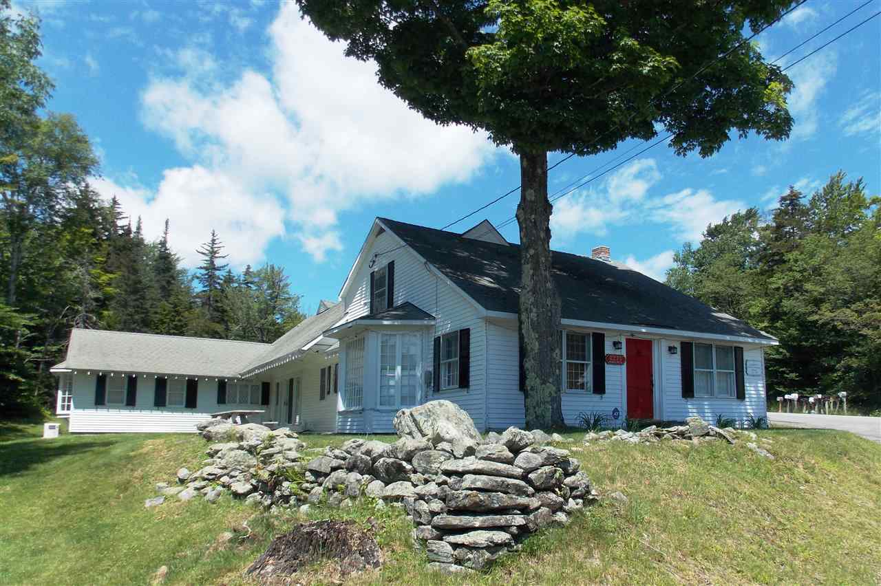 Mix of 1880 school house / town hall with...