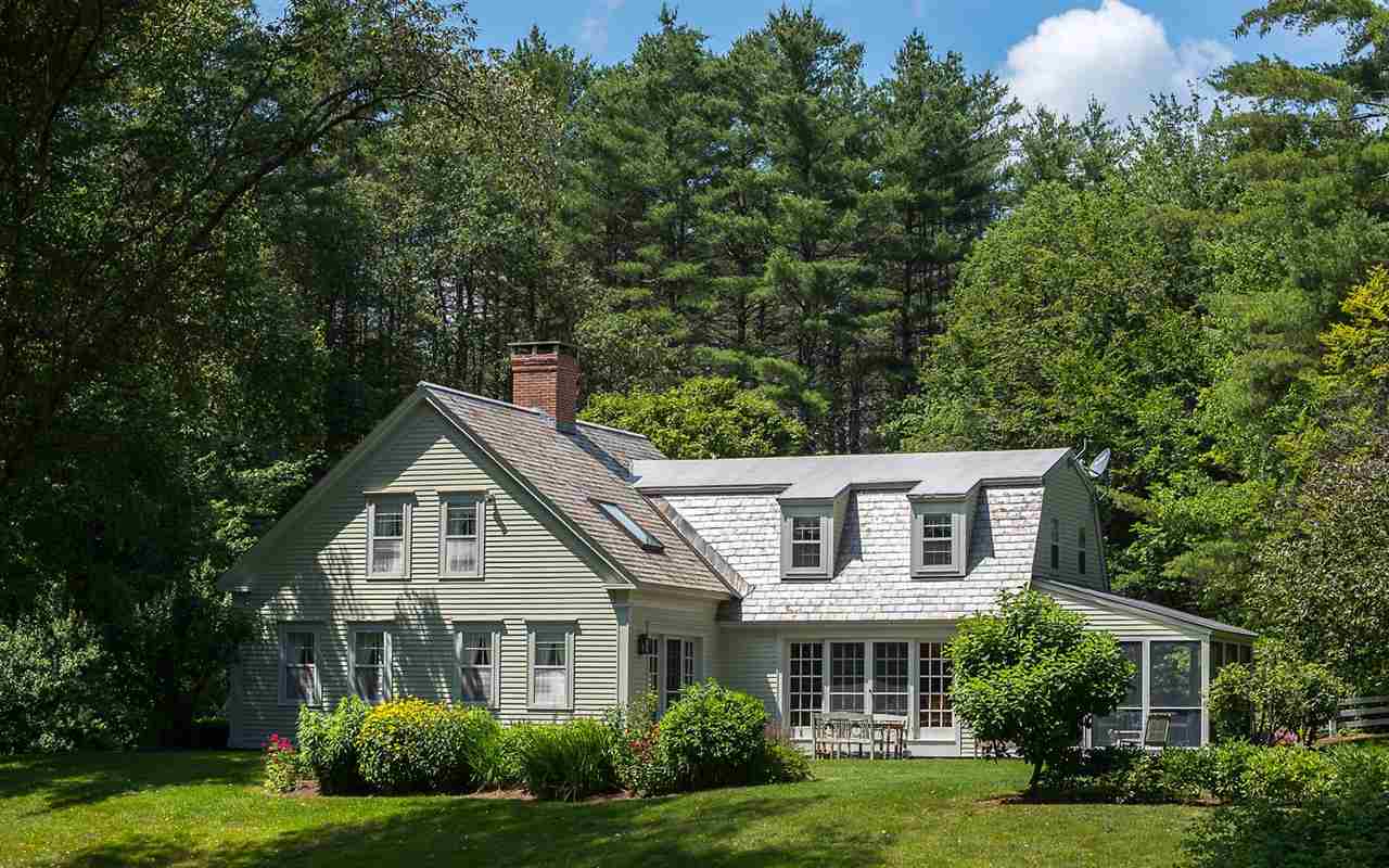 Exquisite, sun-filled home in an idyllic setting!...