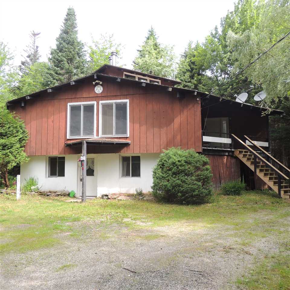 Updated chalet style home with 2 units: 3 bedroom...