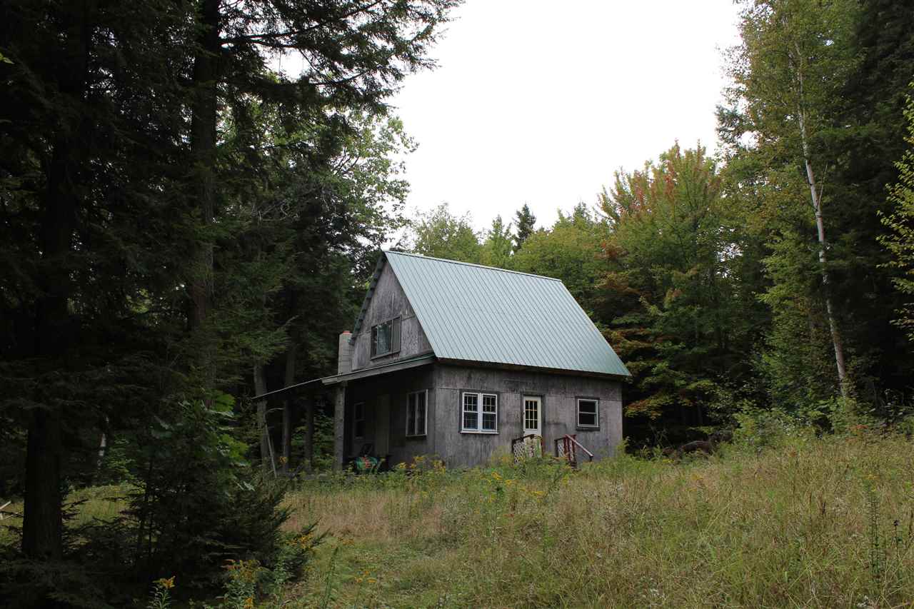 Rustic unfinished 24x24 camp on 10.87 acres. The...
