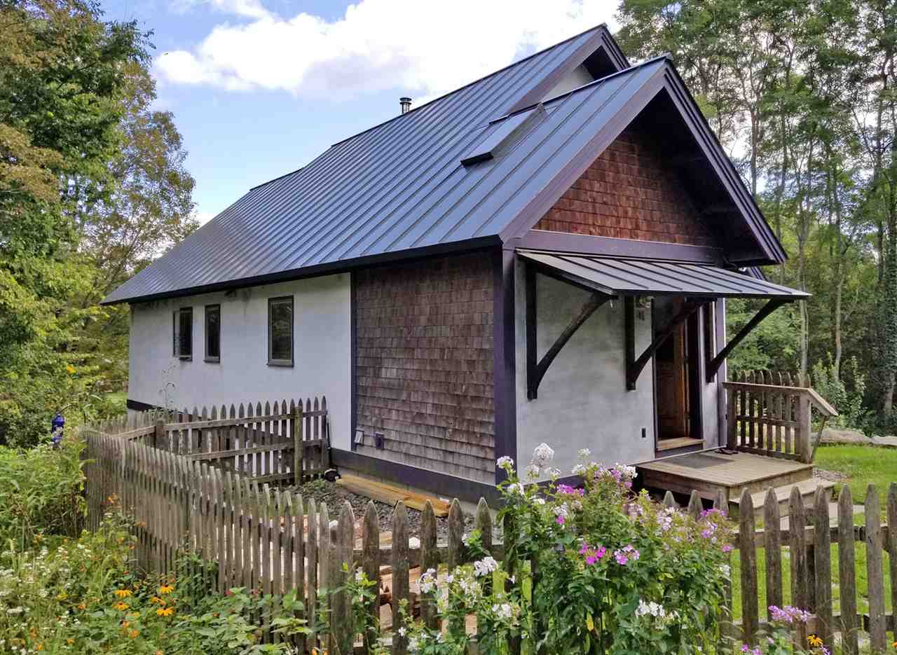 This 10 year old home is tucked into the woods...