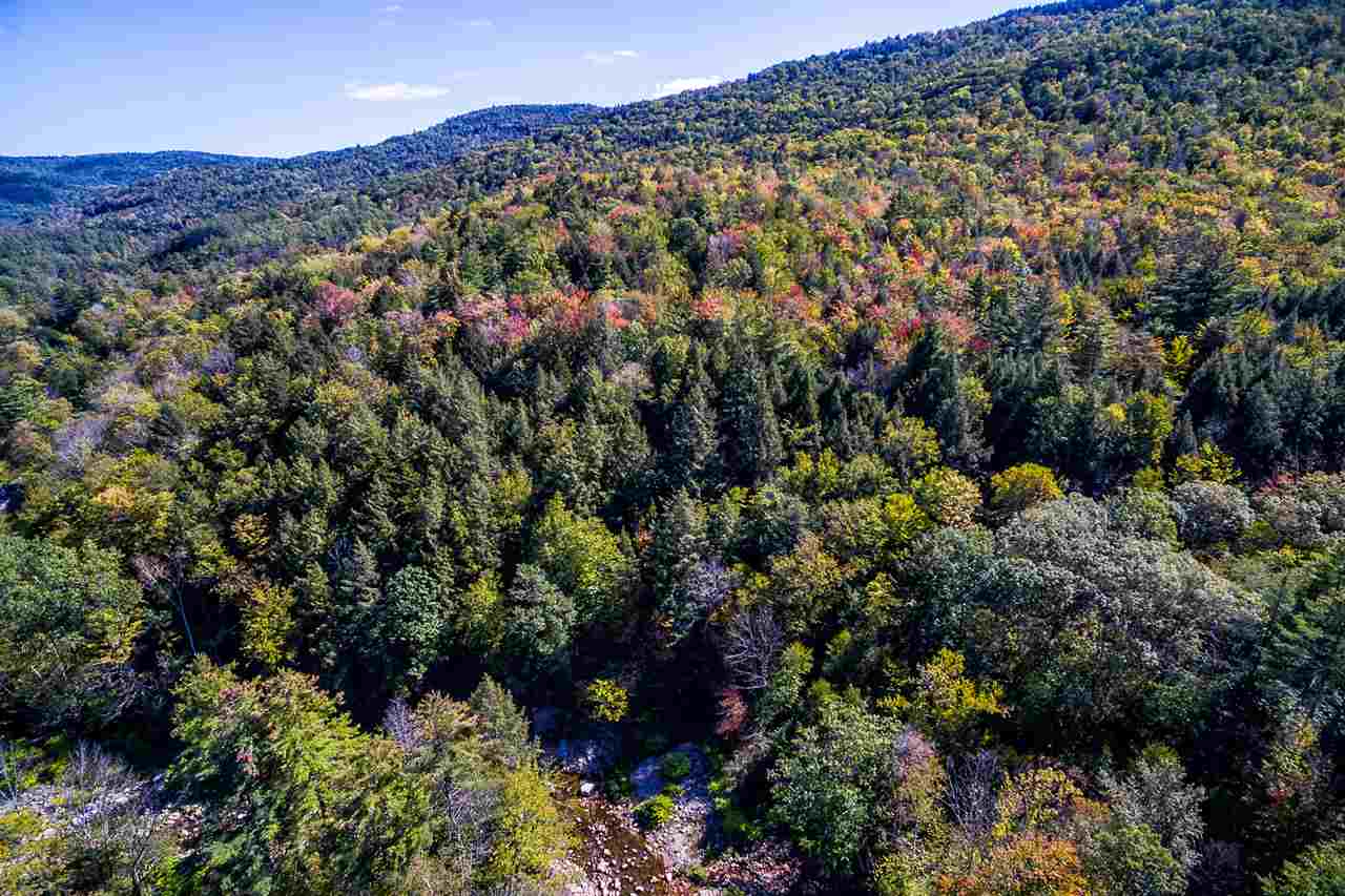 129 acres of mostly wooded and rolling land. A...