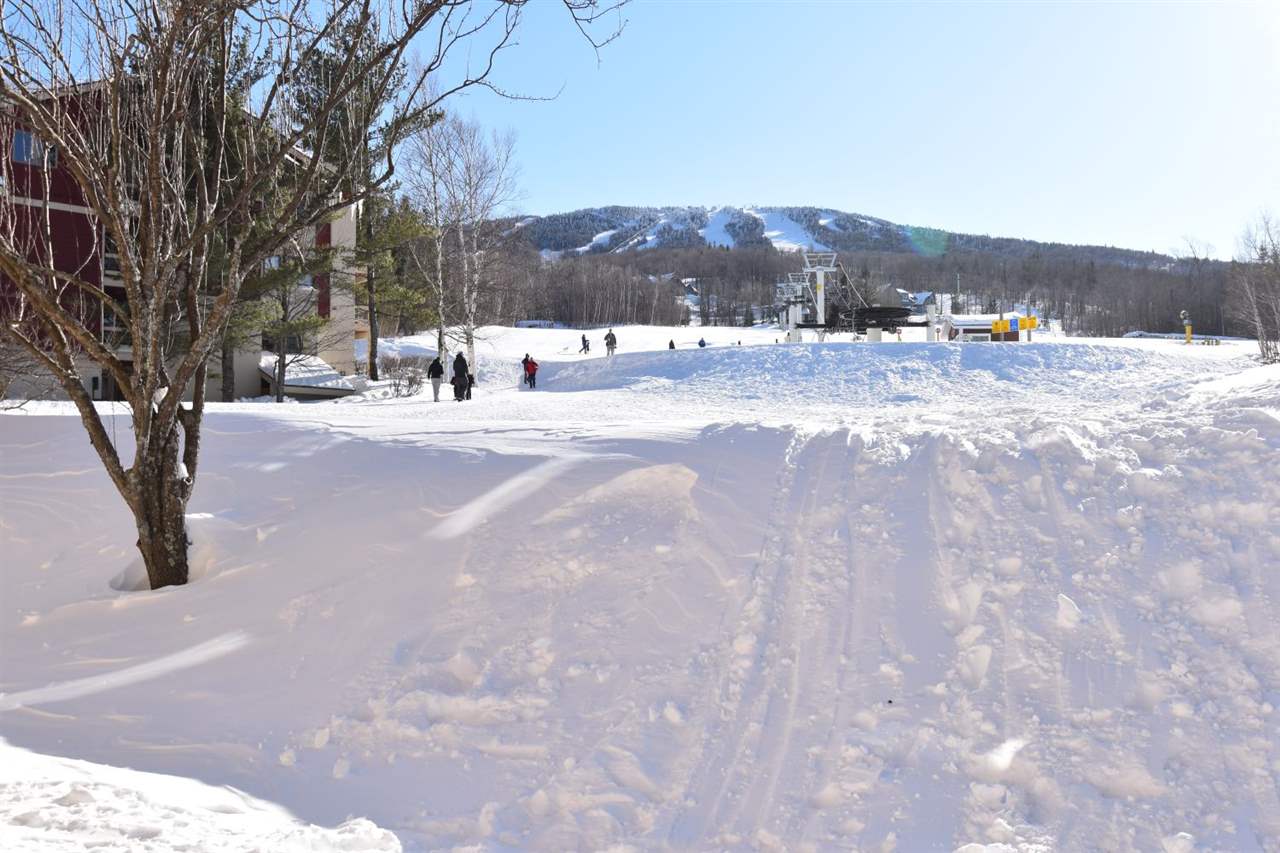 Beautiful slopeside Mountain Watch condo at base...