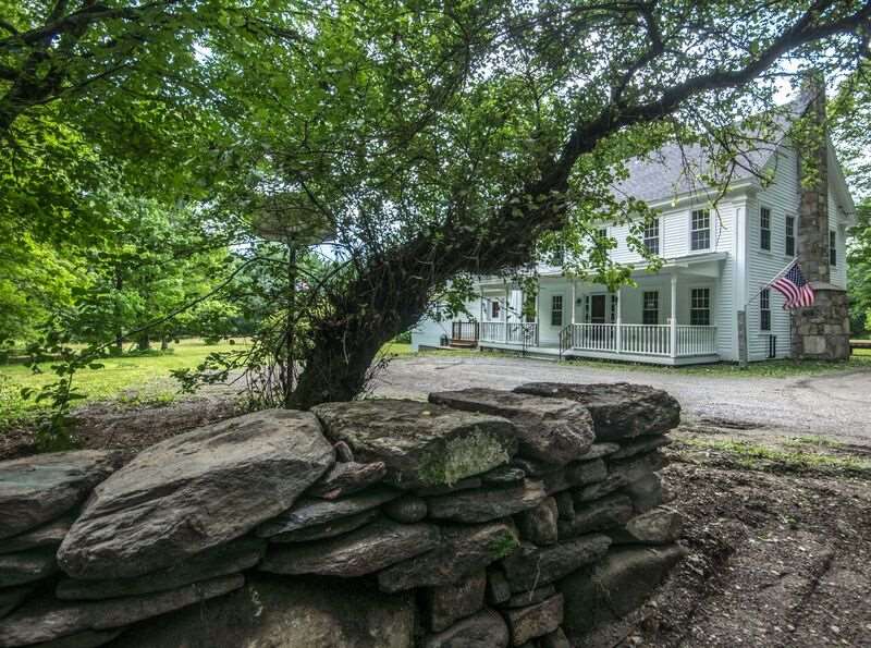 Gorgeous classic Vermont farmhouse with a blend...