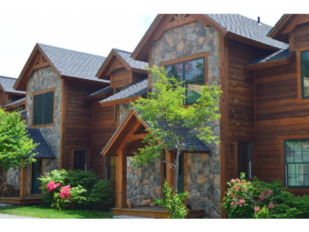 POST AND BEAM TOWNHOME! Three level construction...