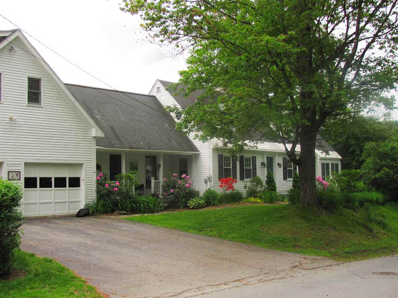 This classic cape-style home has been expanded to...