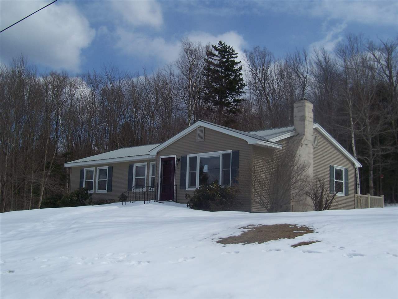 Sweet ranch style home sitting on a knoll...