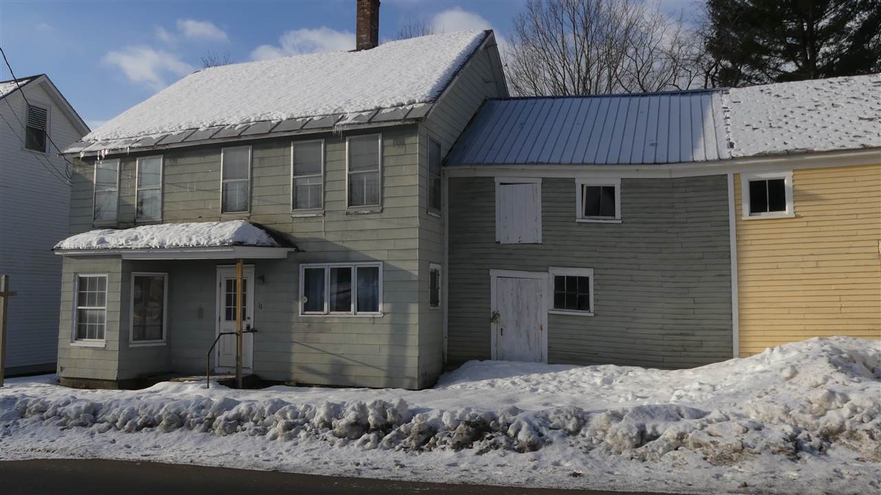Village home looking for new owners!! Handyman...