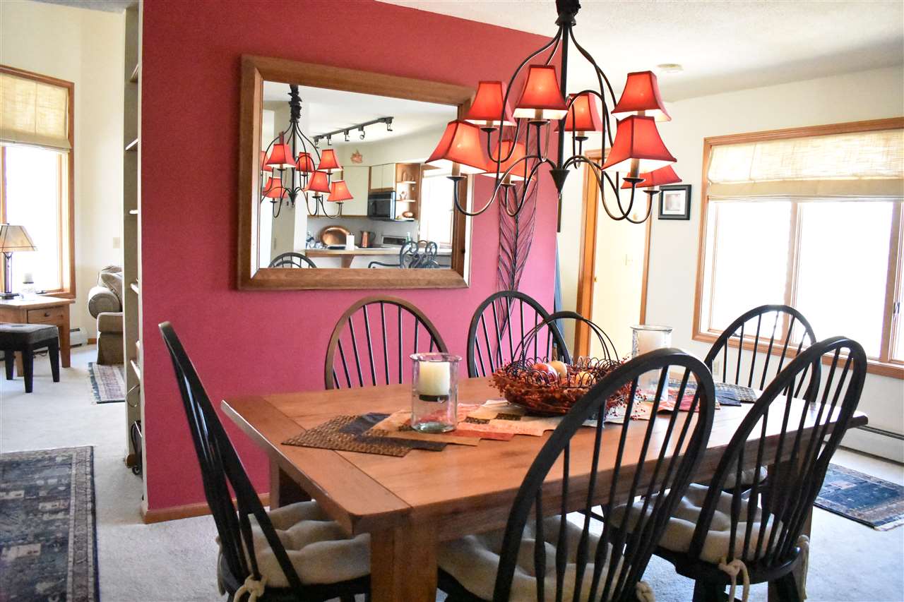Now offered: this private end-of-row townhouse...