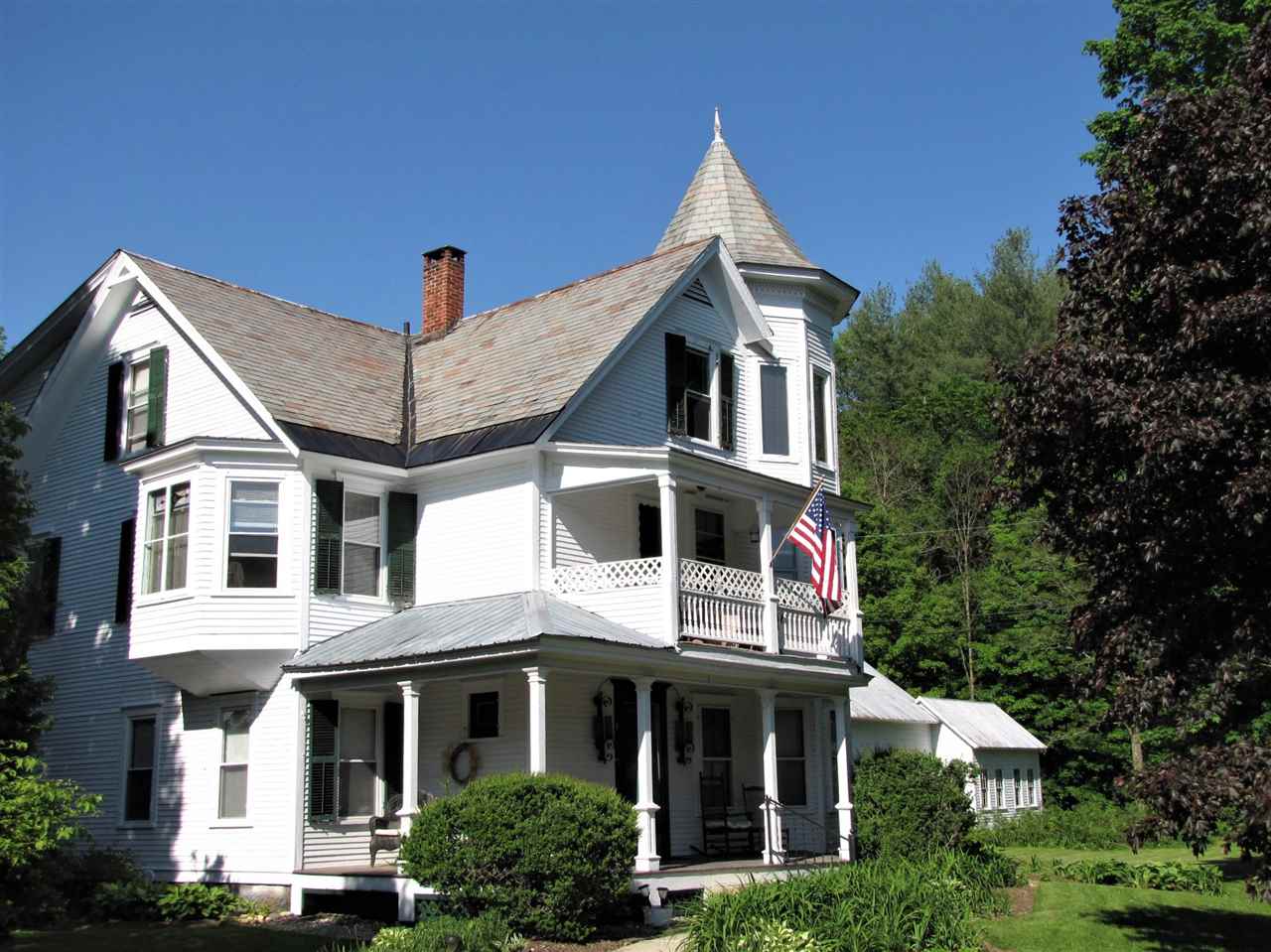 This charming Victorian is across the street from...