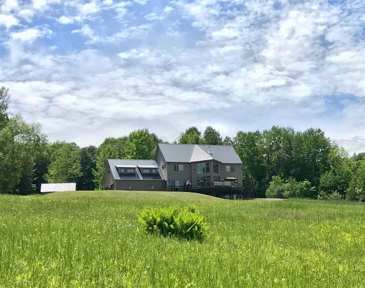 This bold 3-story contemporary is located on a...