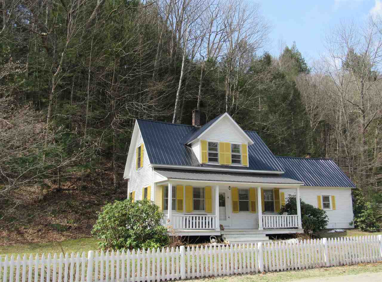 Charming edge of village home with deep front...