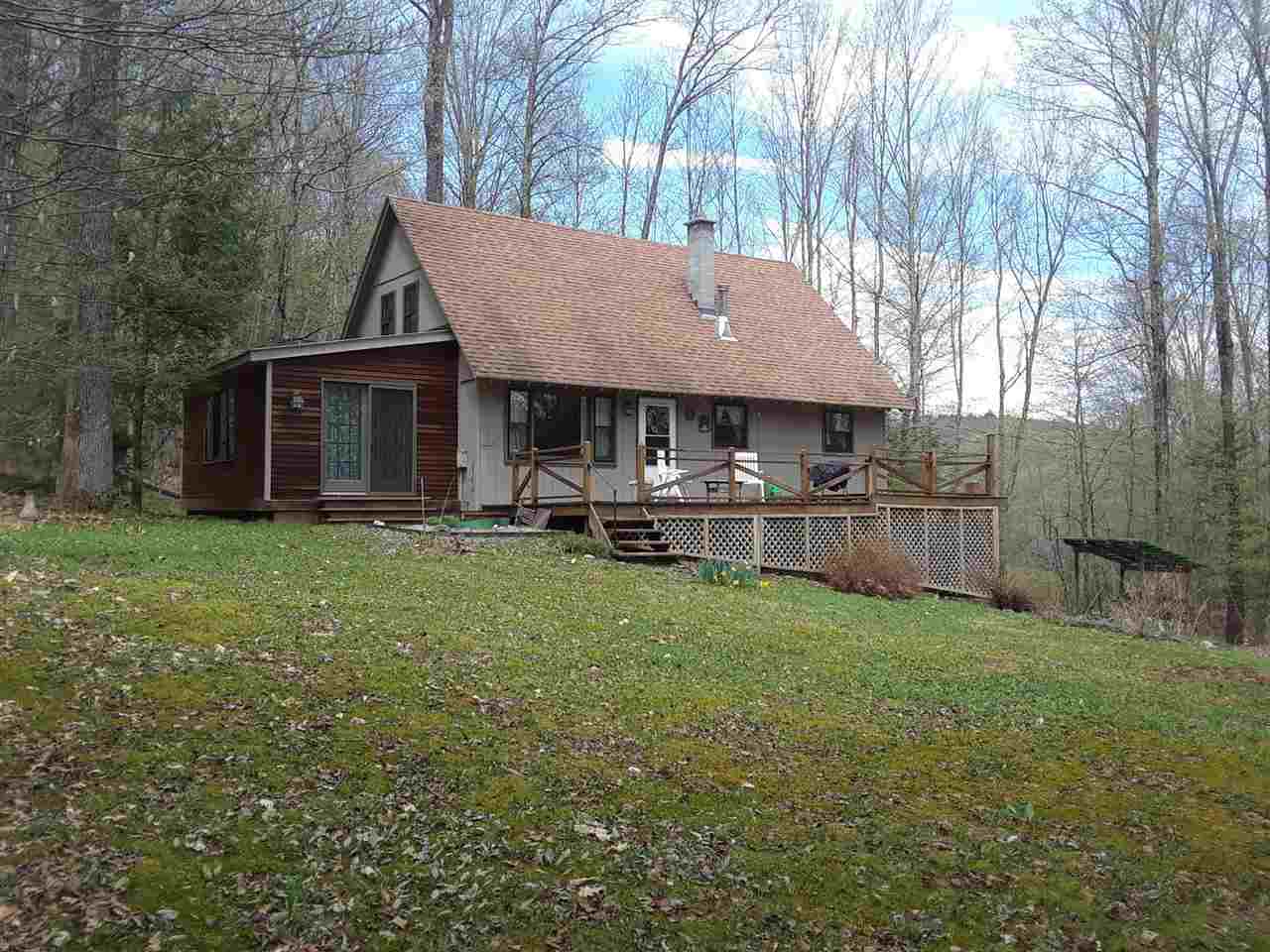 Tucked back from the road on 30 acres of land...