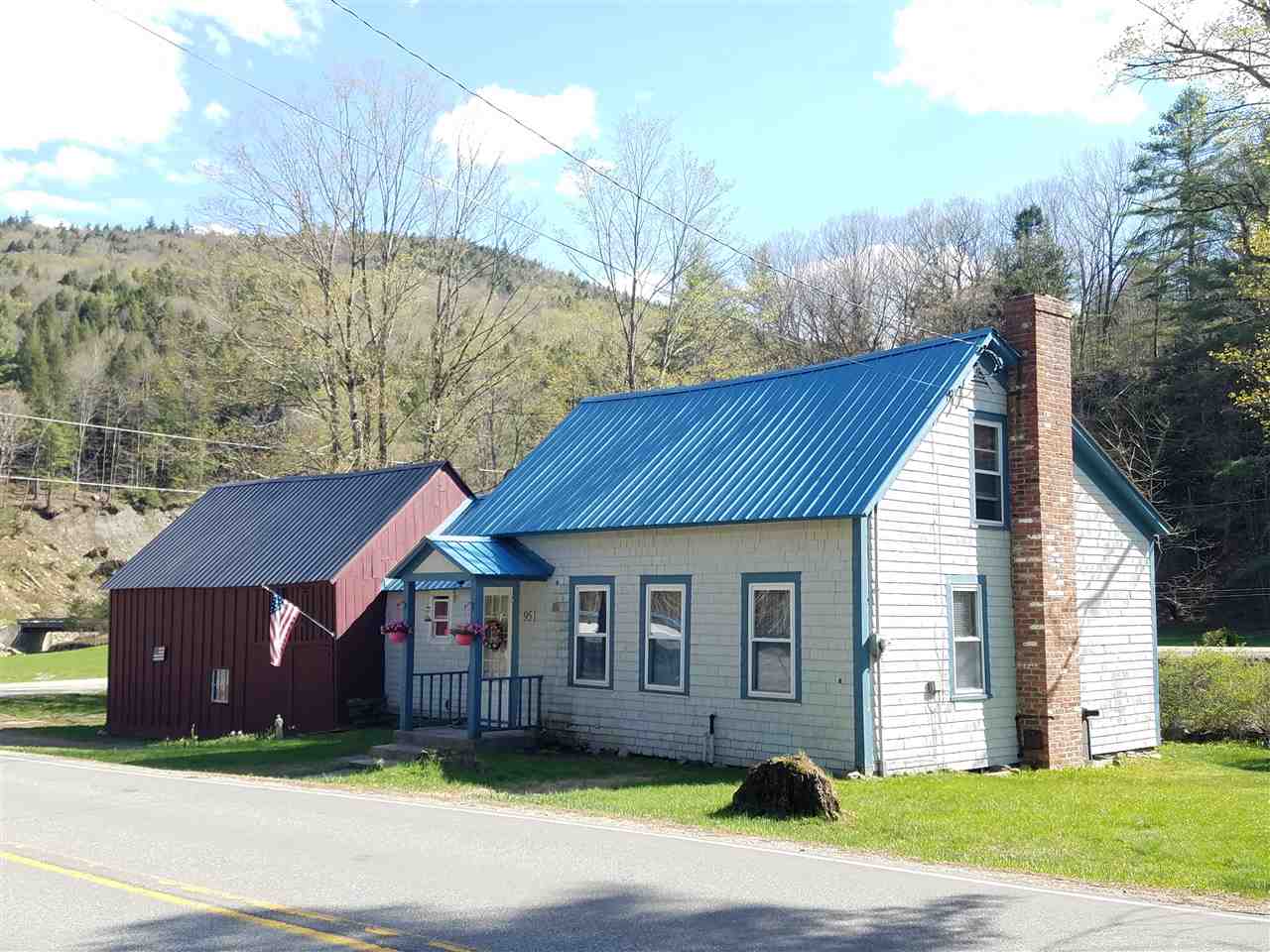 This charming home features beautiful hardwood...