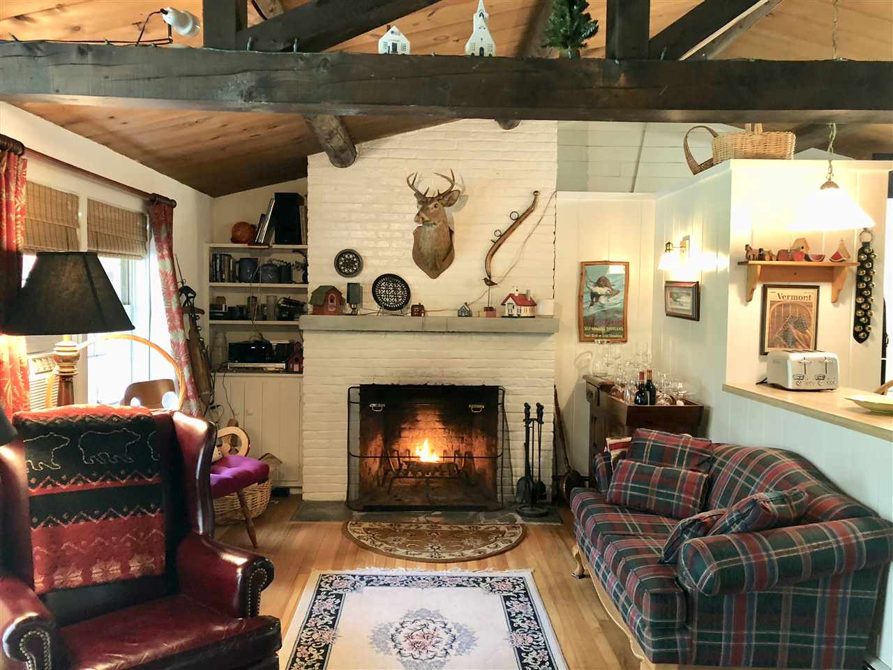 Inviting log cabin set on a quiet country road...