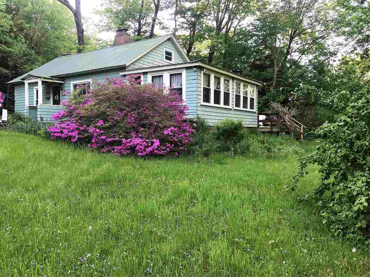 This sweet country cape sits happily on nearly...