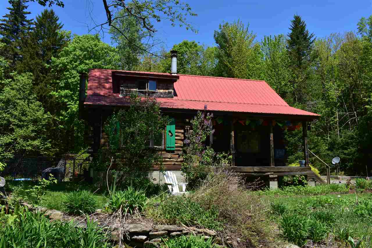 Private and charming log home tucked away in a...