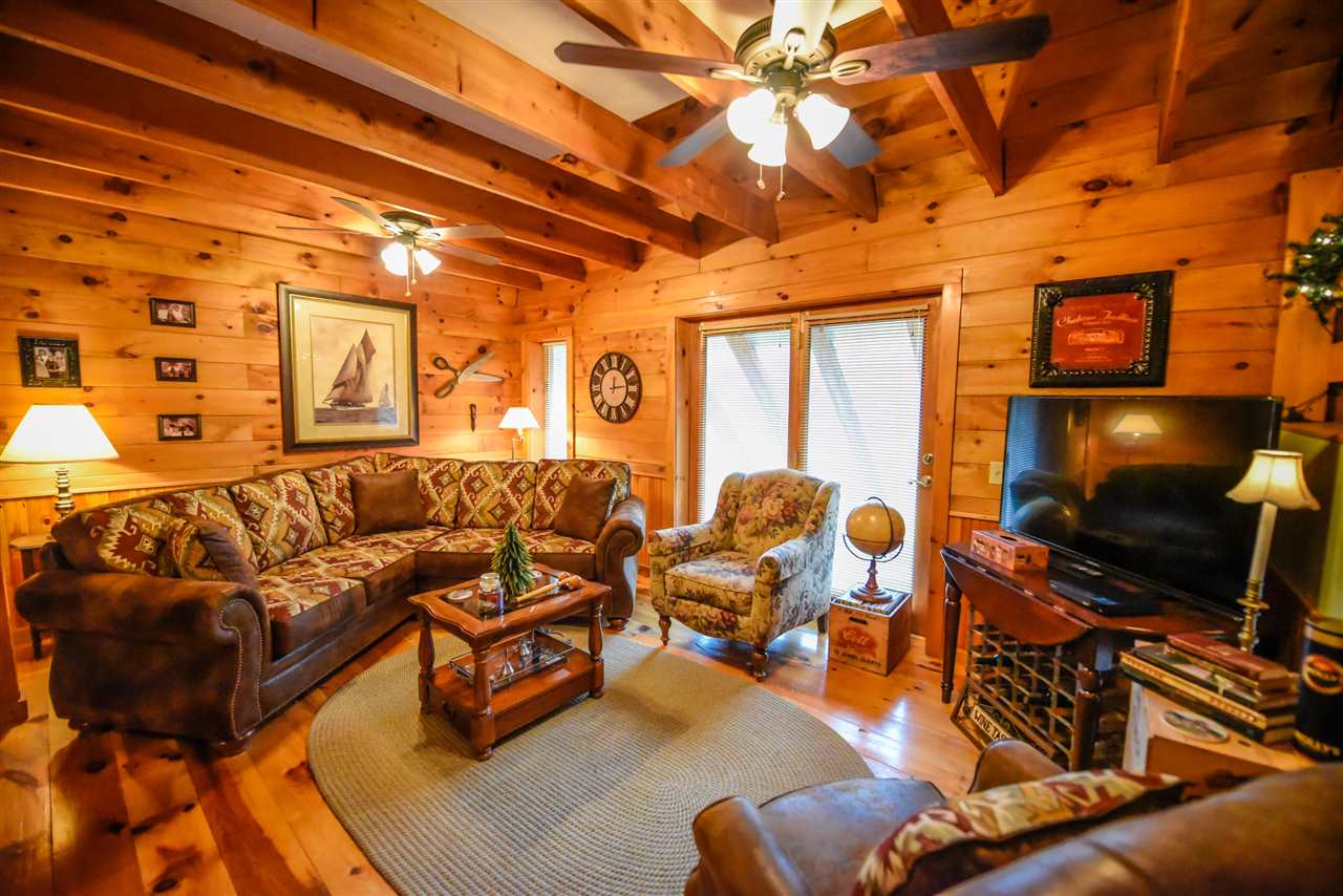 Natural woodwork abounds in this bright updated...