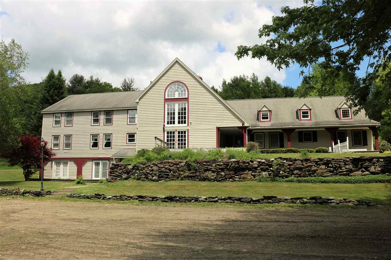 This Southern Vermont Post and Beam Inn serves as...