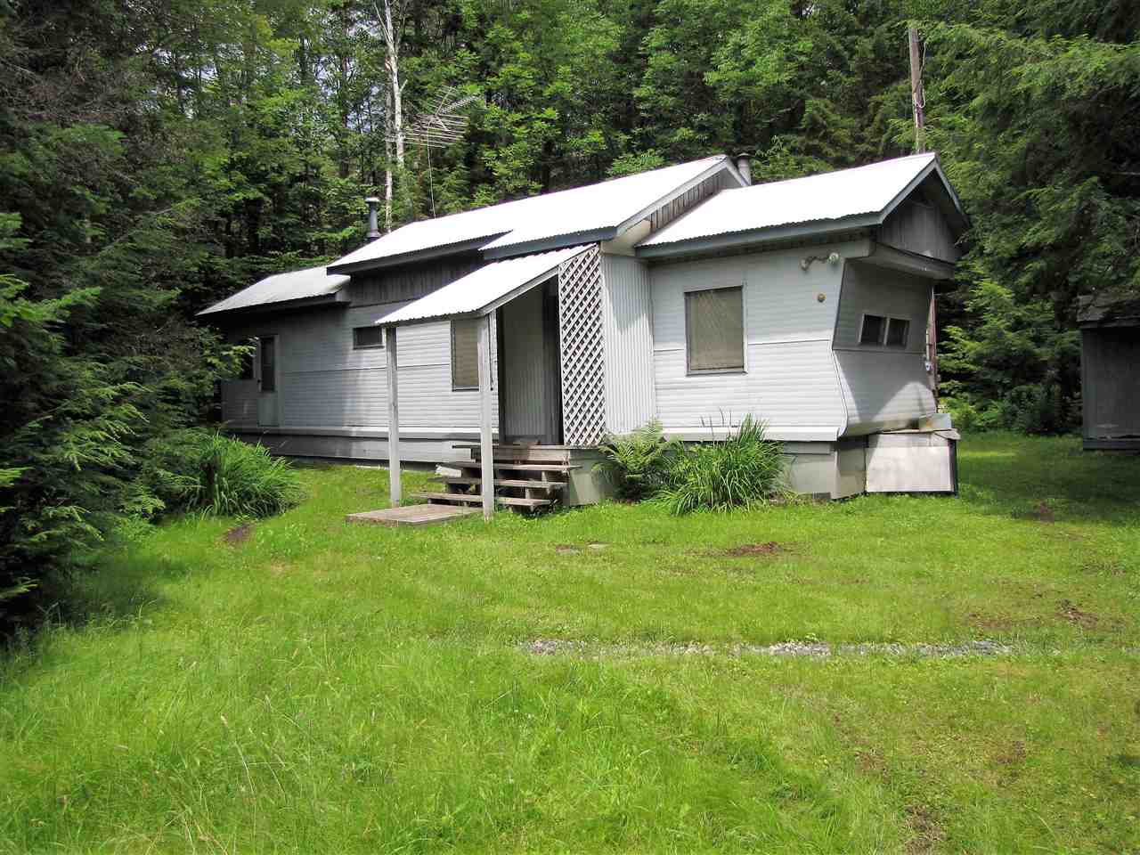 his lovely, level, mostly wooded 1.2 acres, on a...