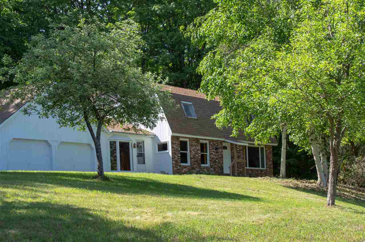 Tucked away, overlooking a lovely meadow, fringed...