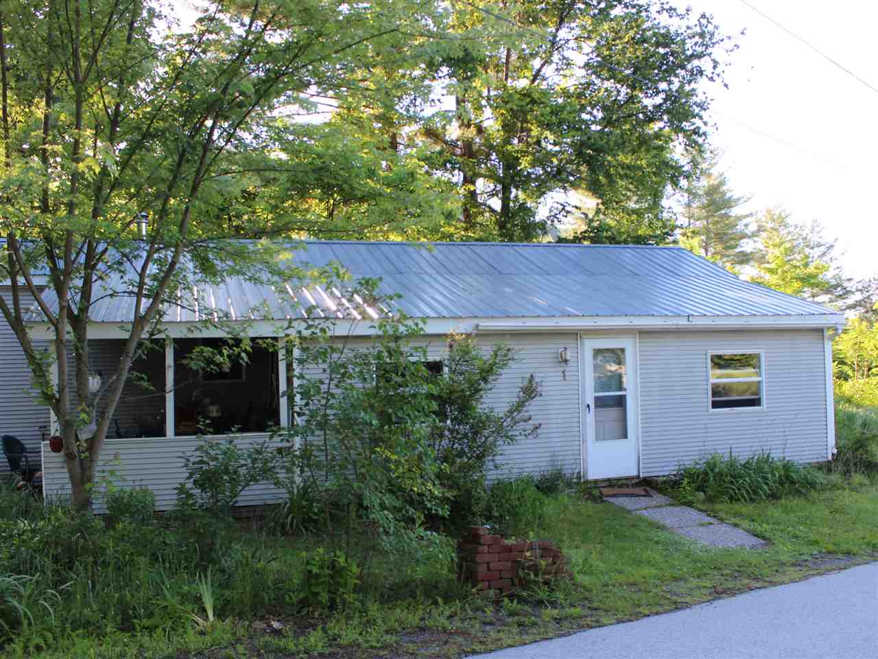 What a great find. This sweet home is on a corner...
