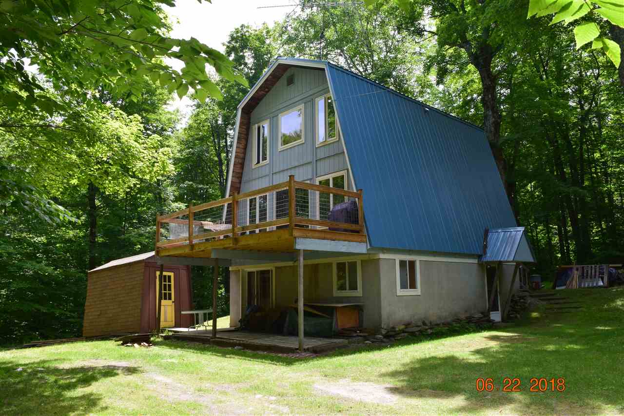 INCOME PRODUCING LOWER LEVEL TWO BEDROOM...