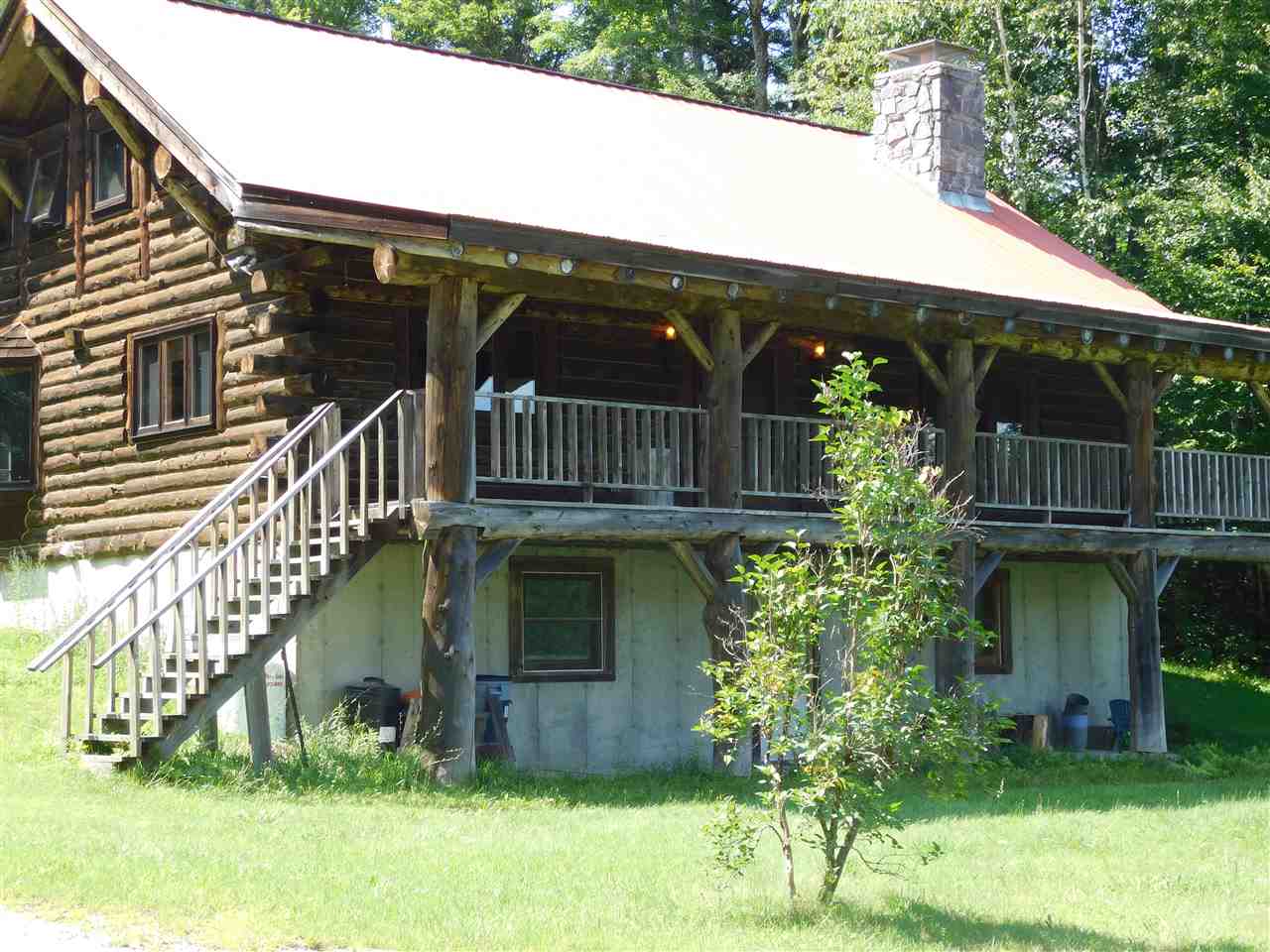 Custom built log home on 10+ acres just a couple...