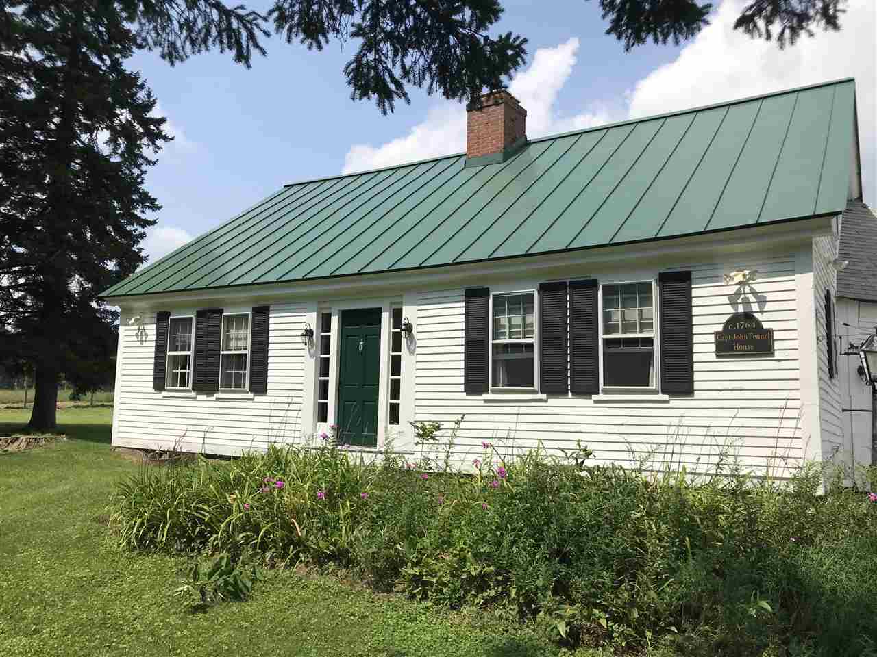 This hilltop farm known as the Capt. John Pennel...