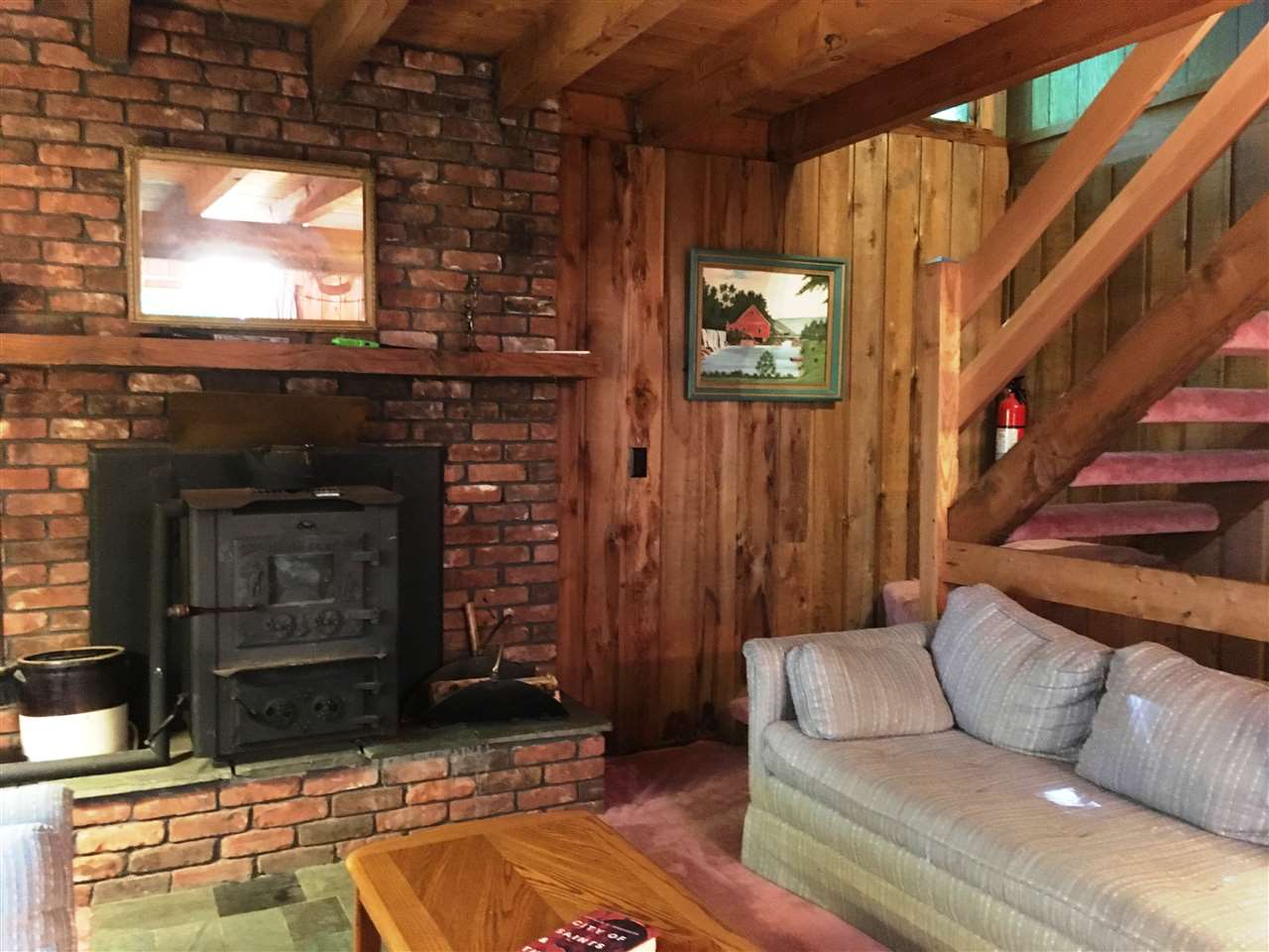 Tucked away on a quiet street, this chalet-style...