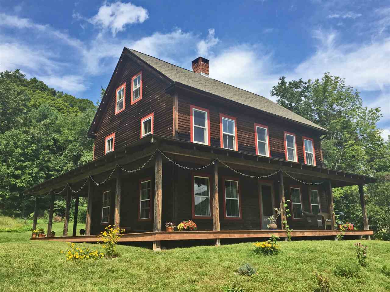 This delightful sunlit home, nestled at the top...