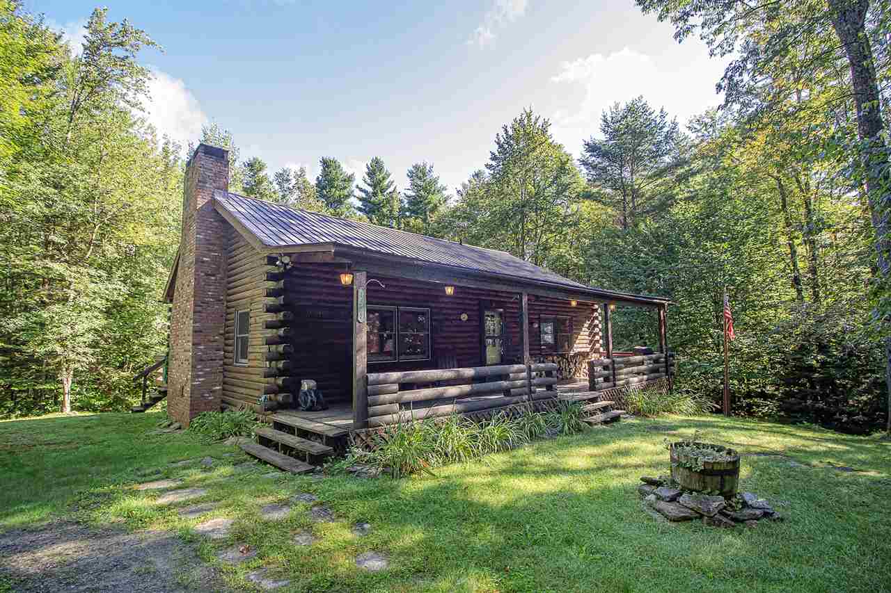Live your Vermont dream in this charming log home...