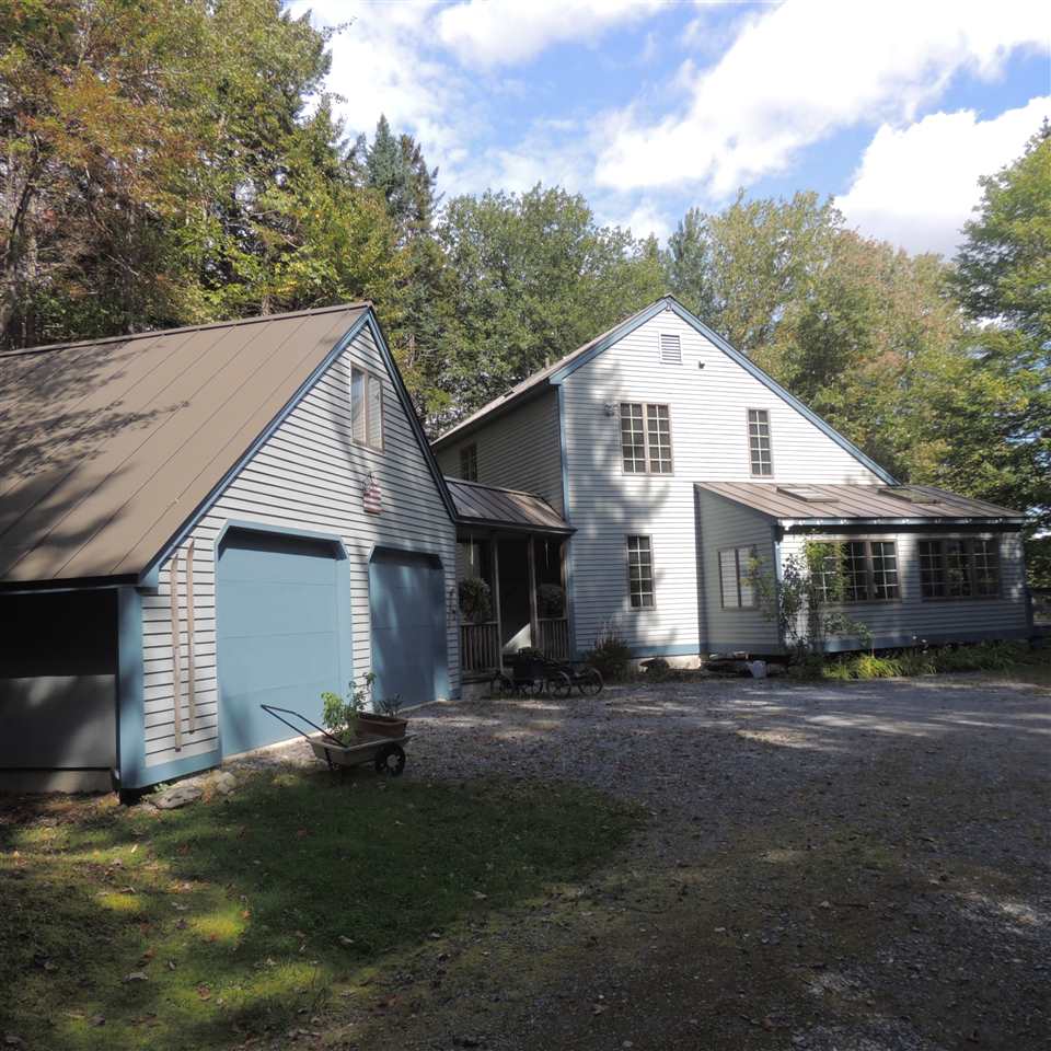 Beautiful 3 bedroom plus loft cape on 2.2 acres...