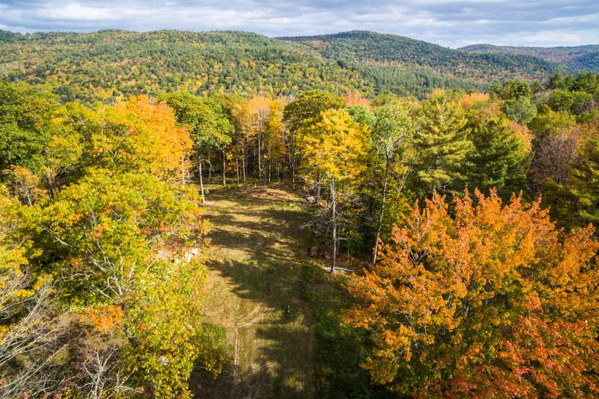 Ready to GO!! This enchanting 10+ acre parcel...