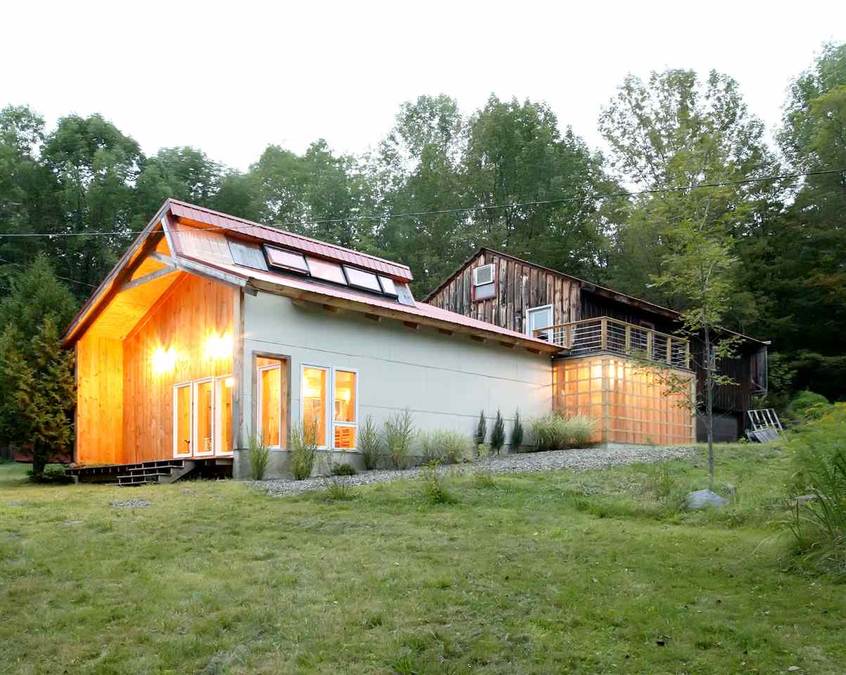 This 1940 s Craftsman-style home and detached...
