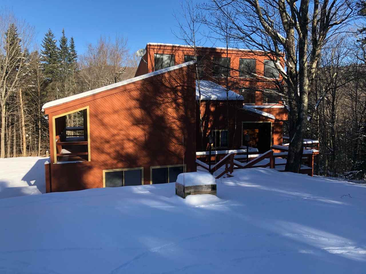 This unique, custom home features tremendous open...