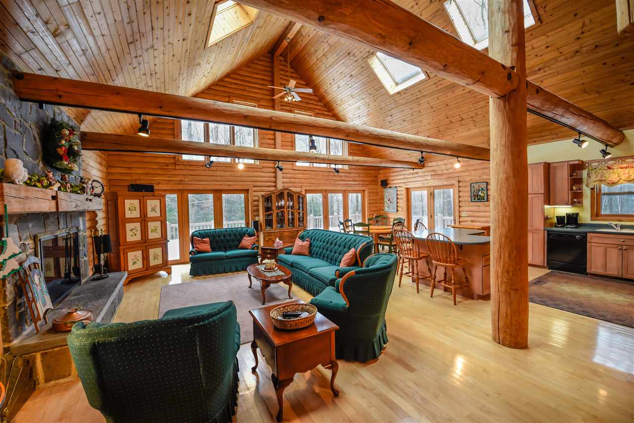 Breathtaking log home on 12 acres just up from...
