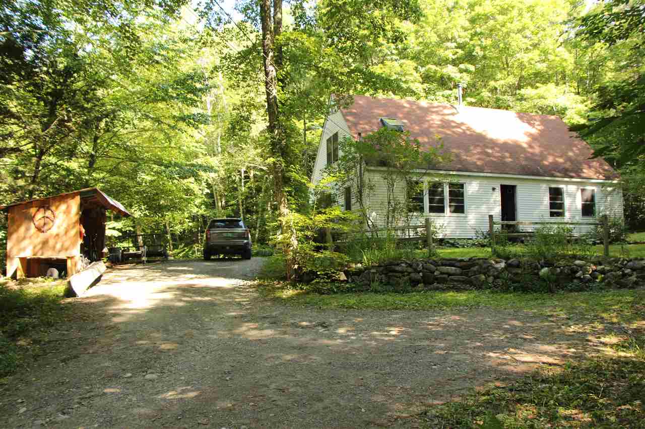 On a back country road sits this comfortable...