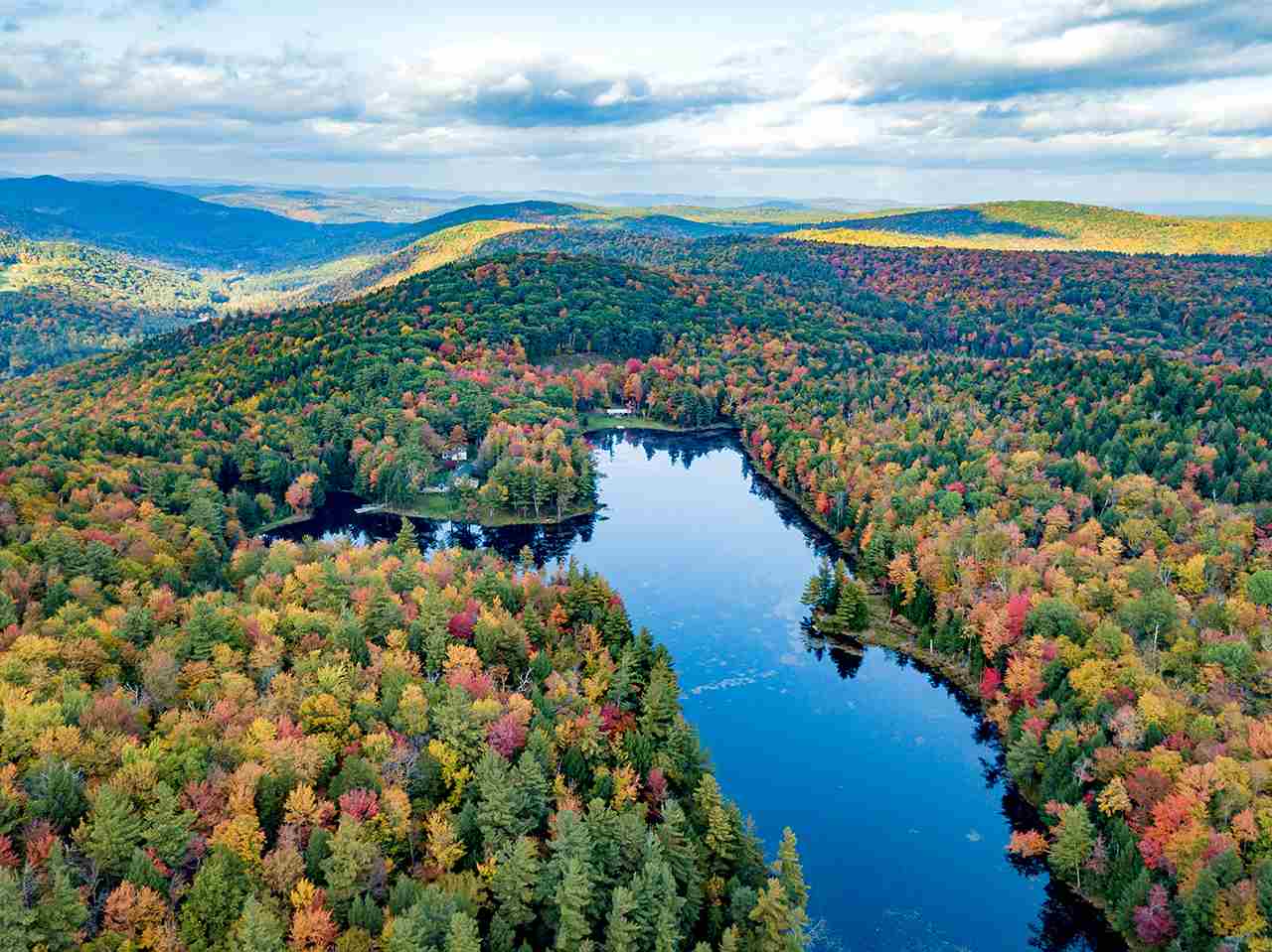 Hidden Lake s compound of cabins surrounds the...