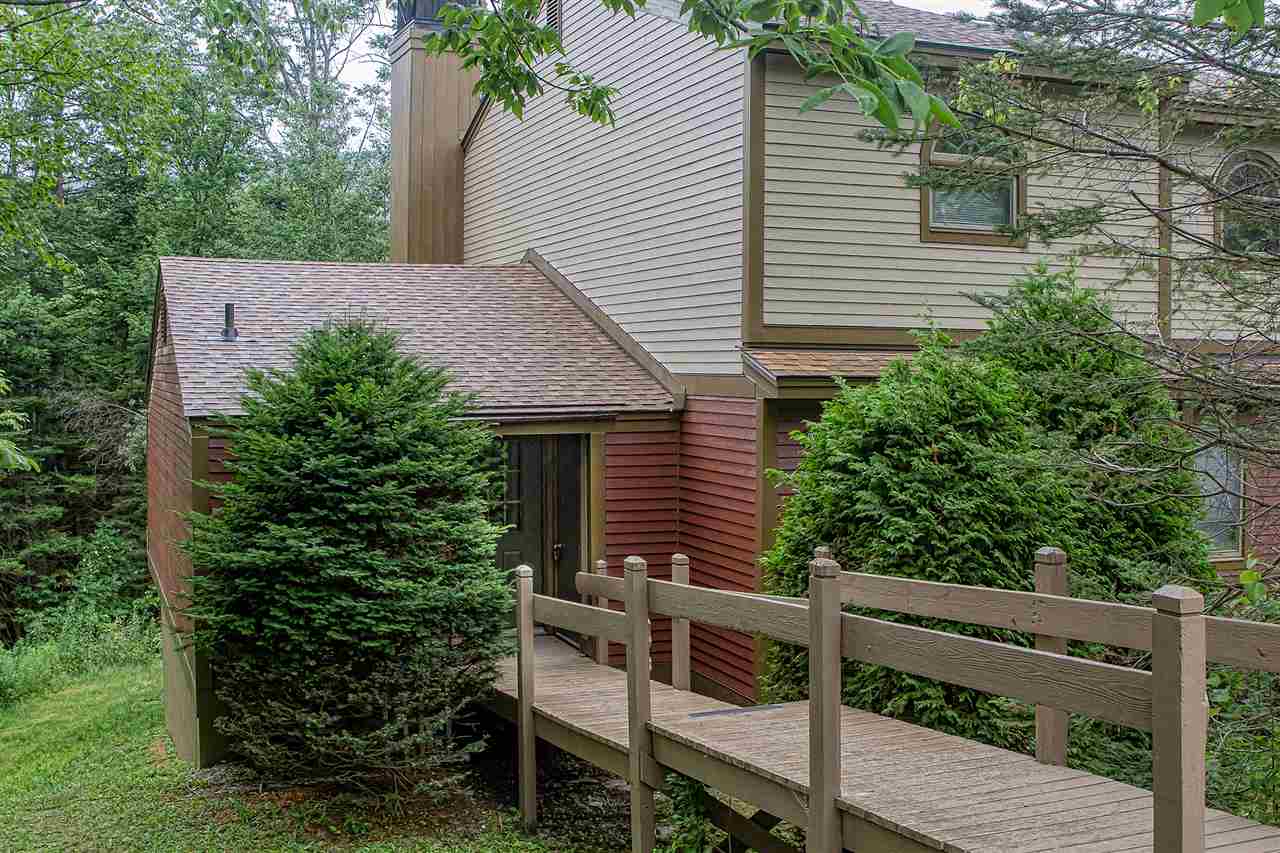 Tastefully renovated Timber Creek end unit is...