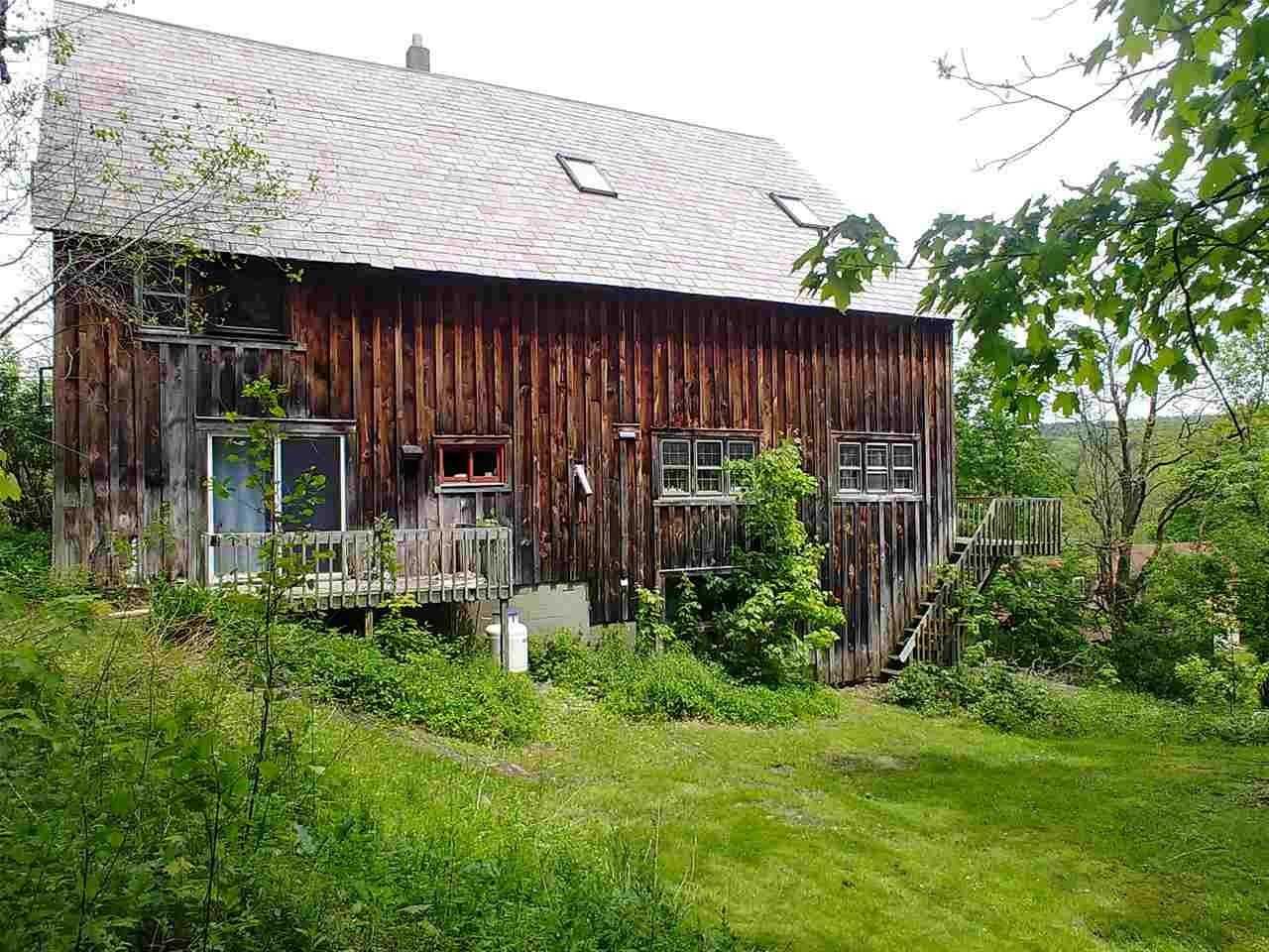 Ingeniously renovated, this Post & Beam barn,...