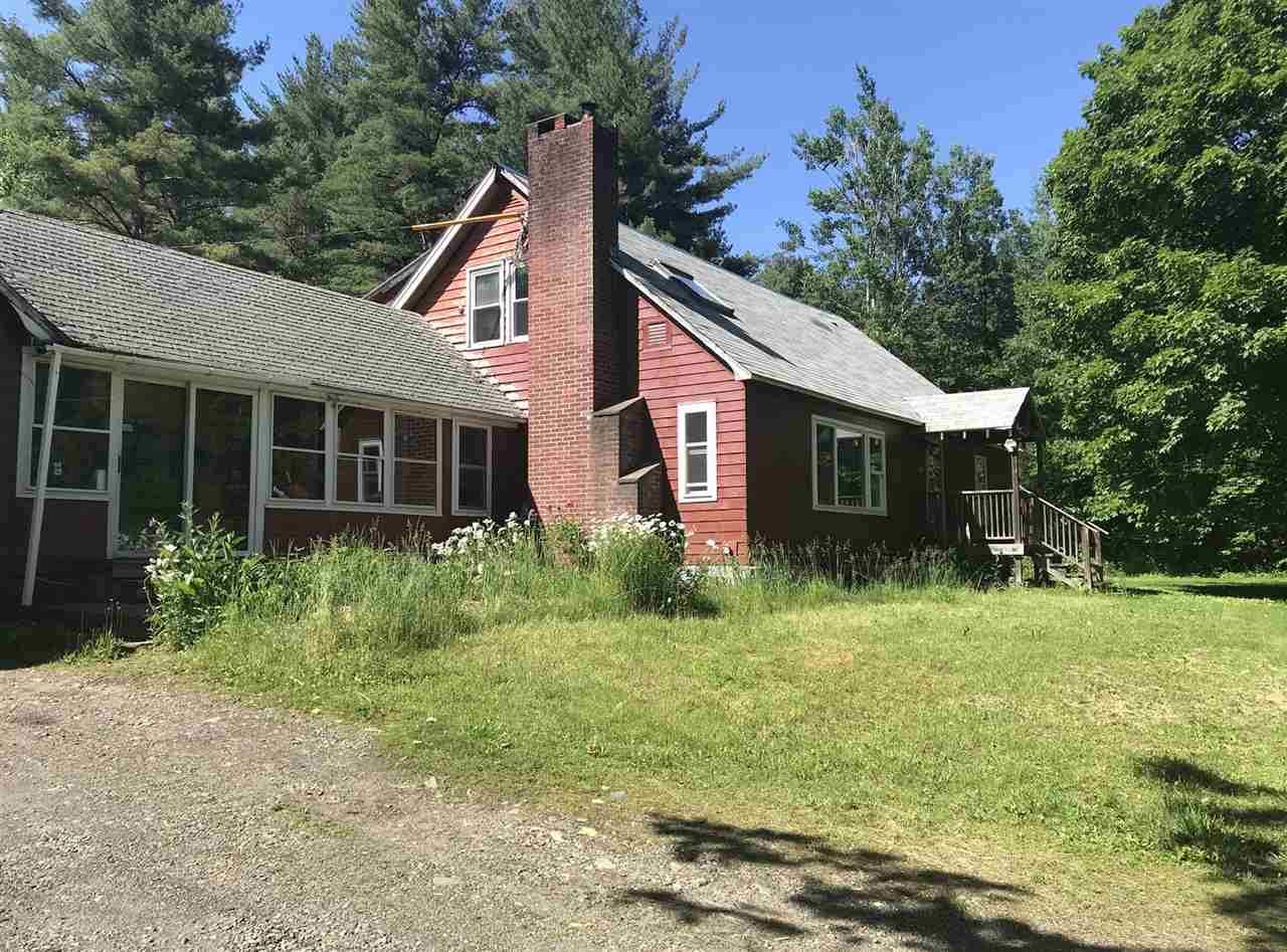 This spacious cape has been converted to a two...